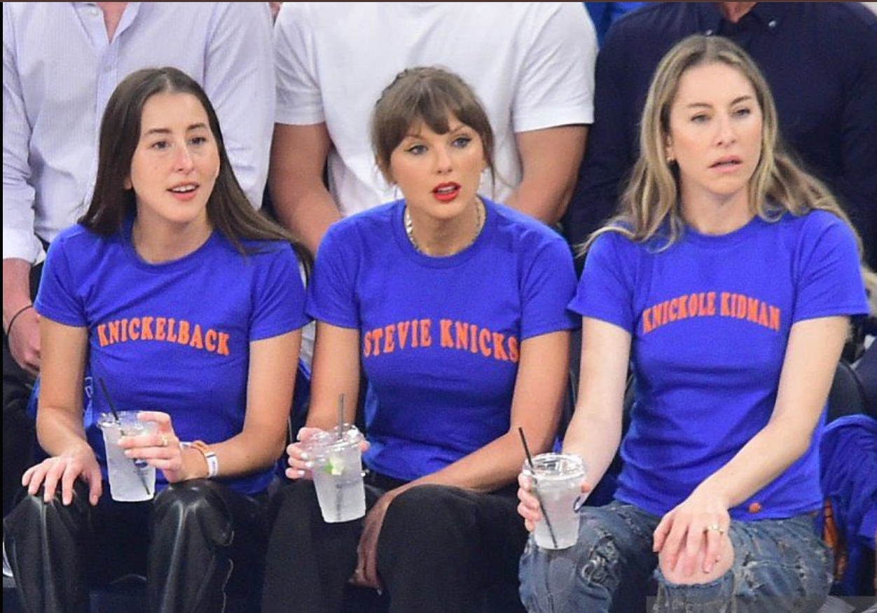 Taylor Swift and HAIM courtside Knicks pun shirt moment during NBA Finals Game 4 culture